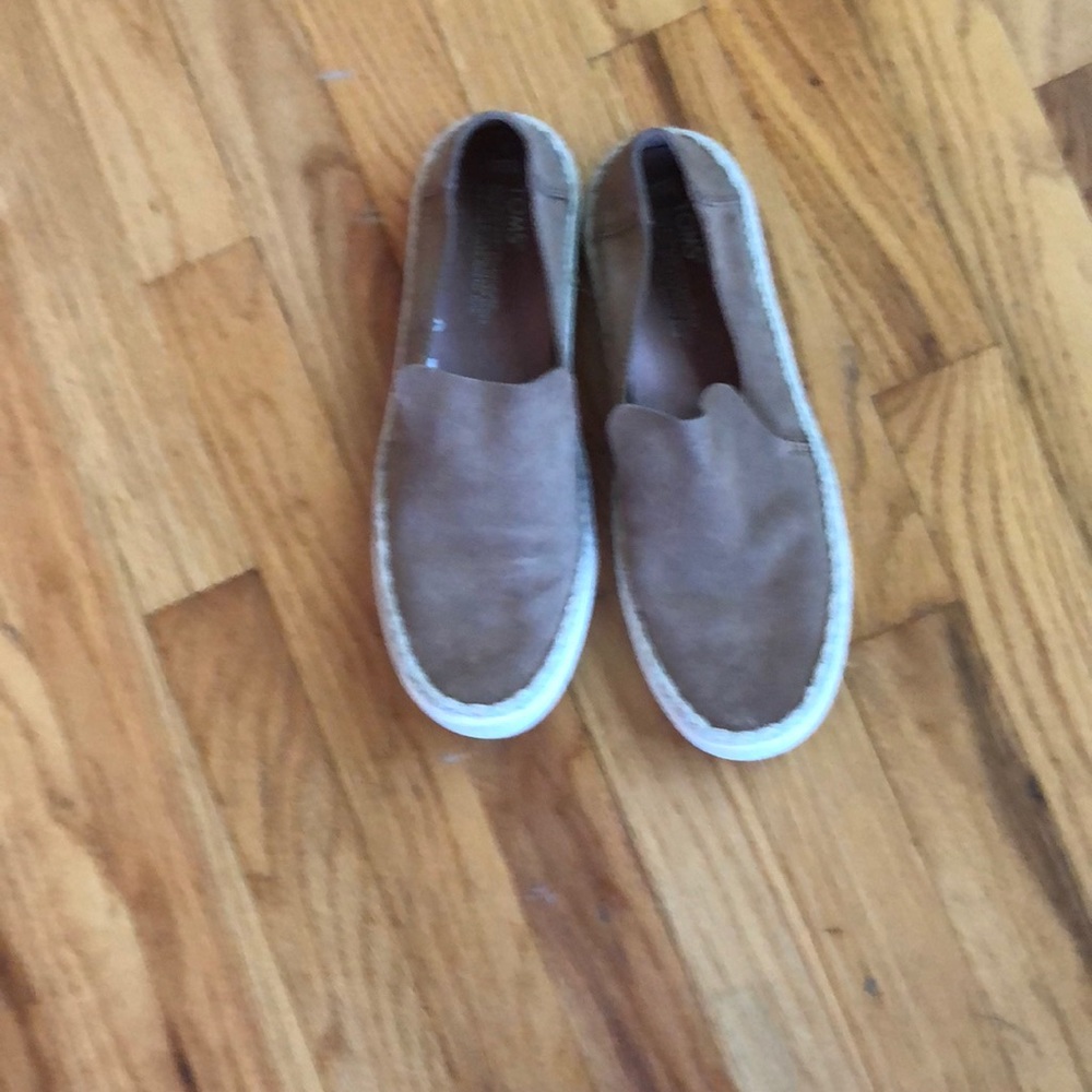 Tom’s slip on faux suede beige shoes. Size 8.5